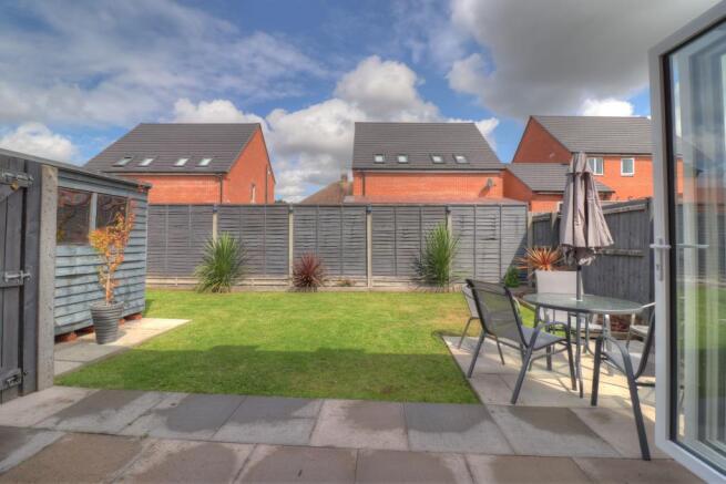 BI-FOLDING DOORS INTO GARDEN