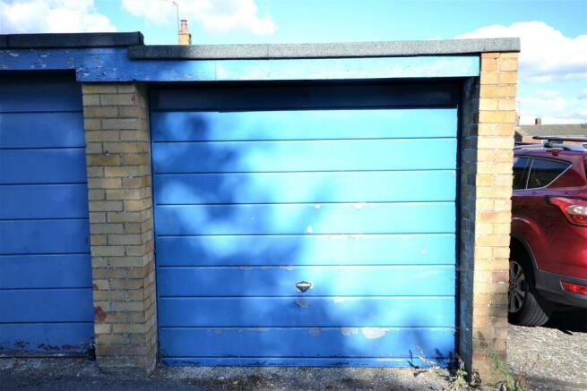 Garage with door to garden
