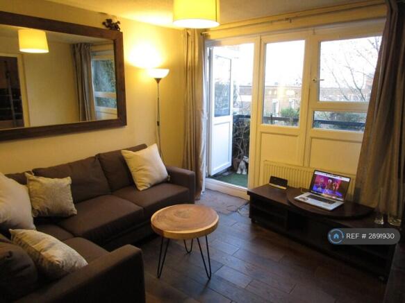Large Lounge Area Leading To Outside Terrace.