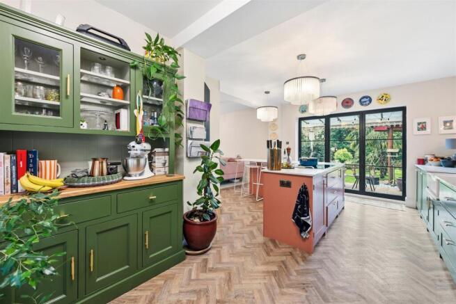 Kitchen to bifold doors and garden.jpg