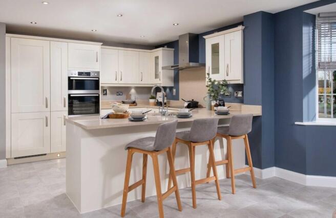 Internal view of large open plan kitchen with breakfast bar
