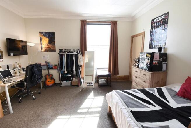 Bright, spacious bedroom with large study area...