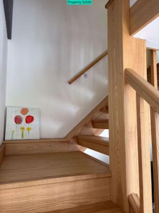 Open plan staircase to upper floor