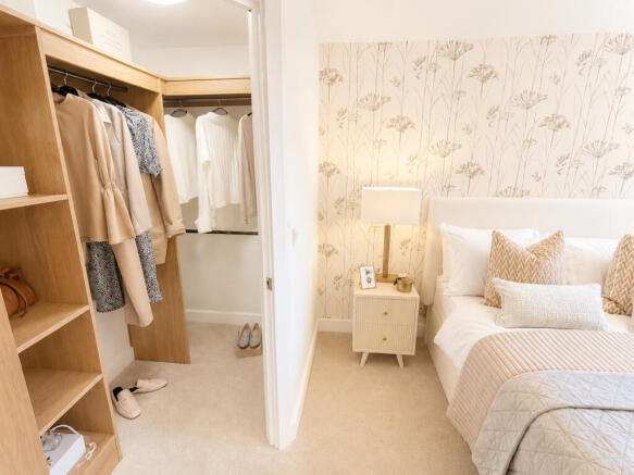 a bedroom with a bed and a closet