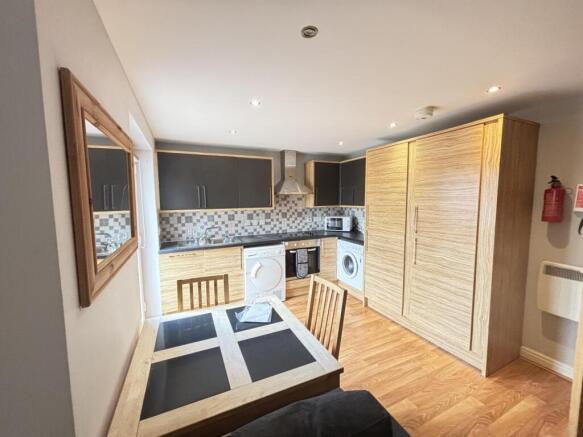 A bright and modern living room featuring a coz...