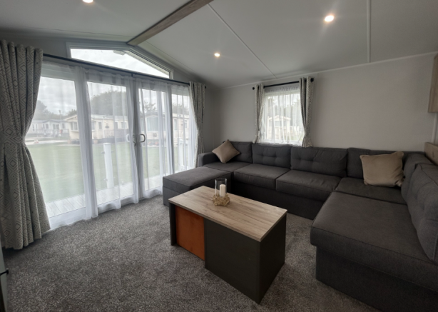 Spacious Lounge With Grey Corner Sofa, Coffee Tabl