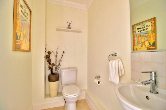 Cloakroom has wide access doorway