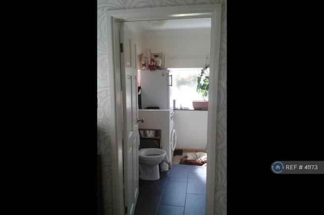 Downstairs Toilet/Shower/Utility Area