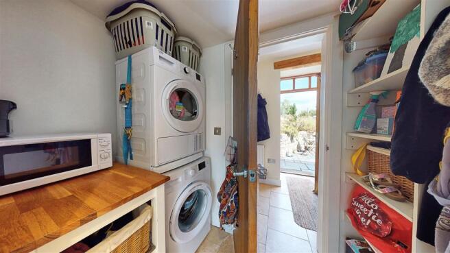CLOAKROOM/UTILITY ROOM