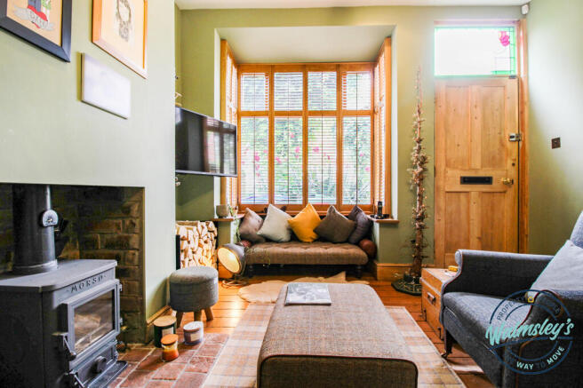 Sitting room with bay & log burner