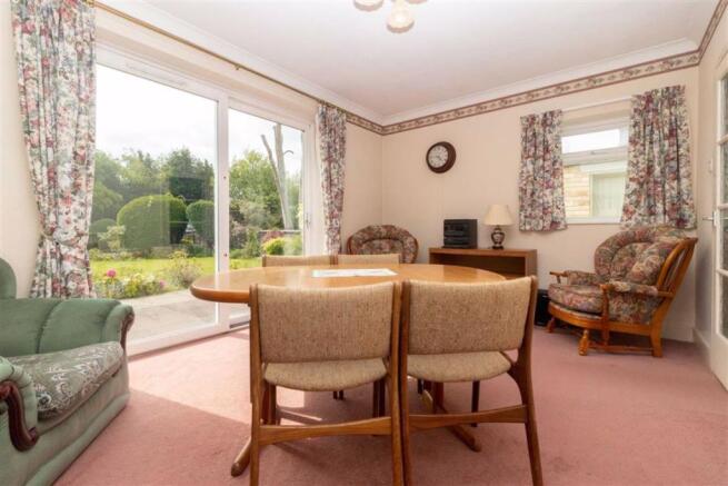 REAR DINING/SITTING ROOM