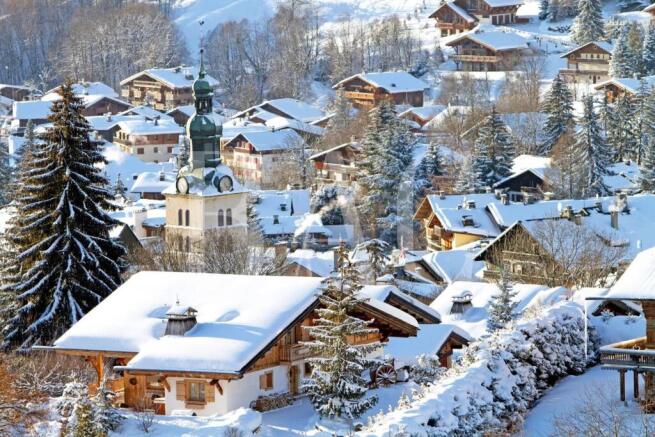 Megeve, a picturesque, snowy Alpine village with w