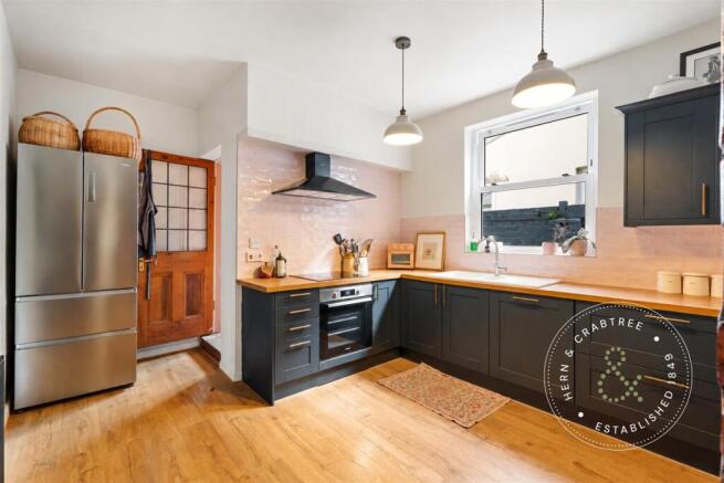 Finished Kitchen with Pink Tile Backsplash.jpg