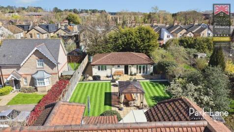 2 properties ( 5 Bed house & 2 bed bungalow on same plot)