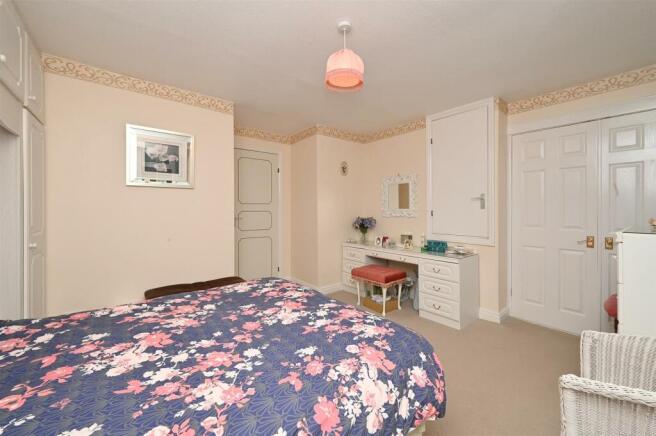 Bedroom One towards wardrobes and door.jpg