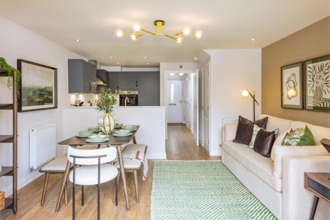 Dining space inside the Willesley three bedroom home at Orchards Rise