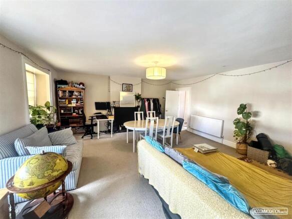 Spacious open living room with dining area...