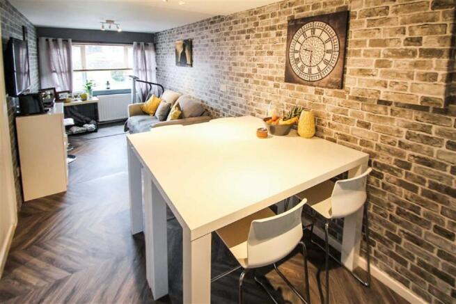 Former Garage used as a Dining Room (see agents no