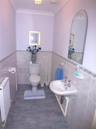 CLOAKROOM AND TOILET