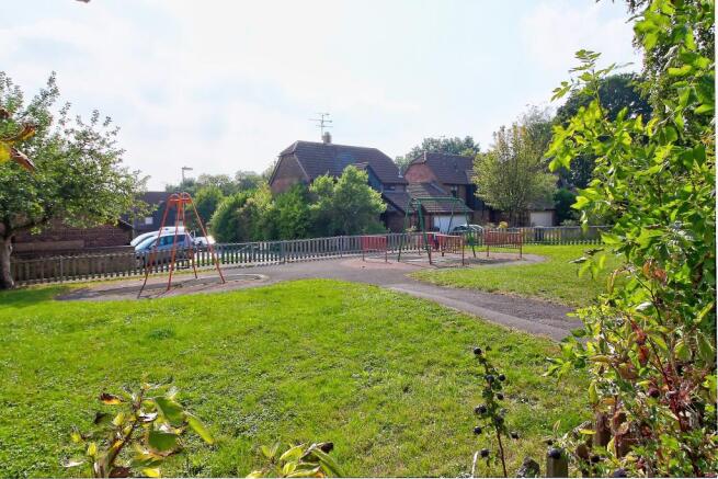 View of park in front of house