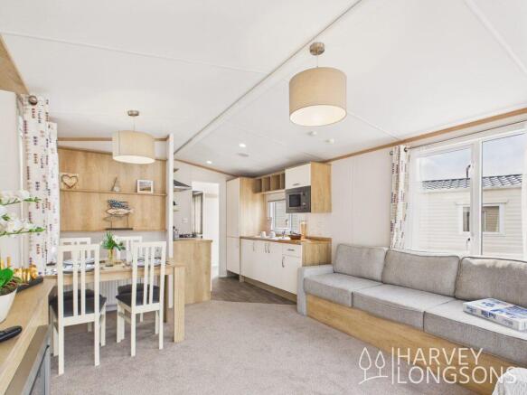 Bright open-plan living, dining and kitchen area.