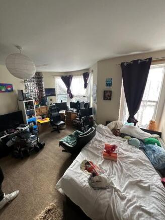 A spacious and bright large double bedroom with...