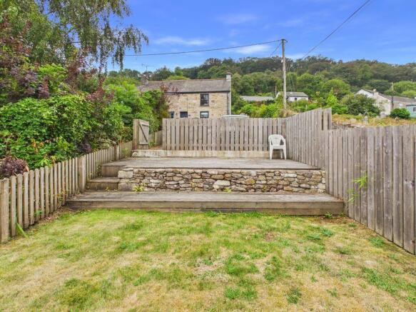 Garden to Front behind parking