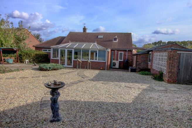 Rear view of property from lower tier