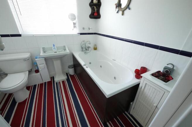 FAMILY BATHROOM:-