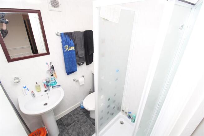 Bright bathroom with a sleek walk-in shower...