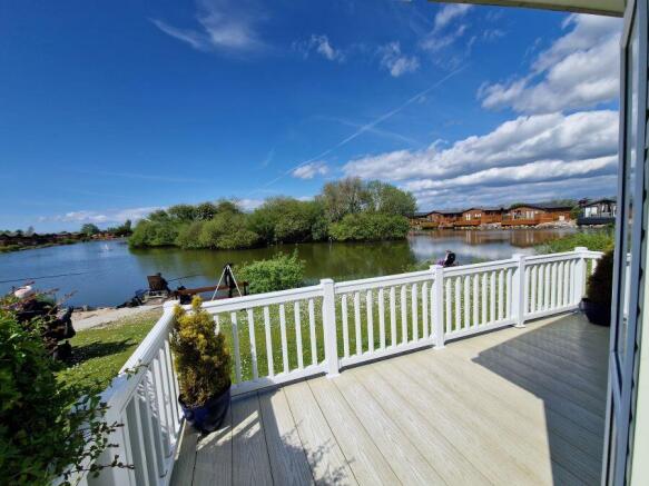South Facing Decking Overlooking The Lake