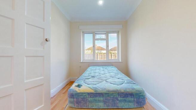 Bright and airy room with large window...