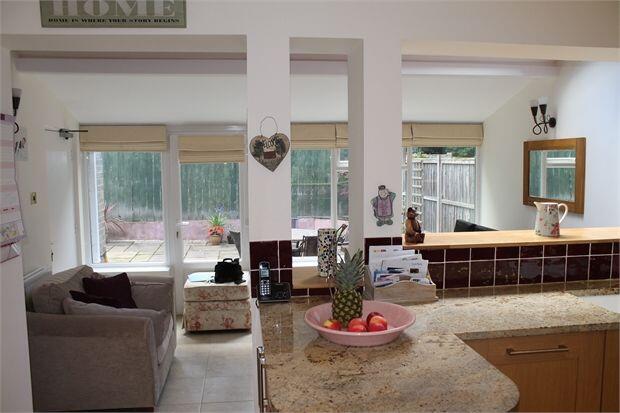 (Open Kitchen & Dining Room)....