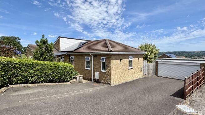 Front Aspect and Double Garage