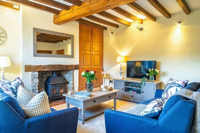 The sitting room with fitted storage