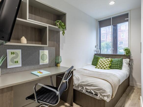 Bright modern bedroom with dedicated study spac...