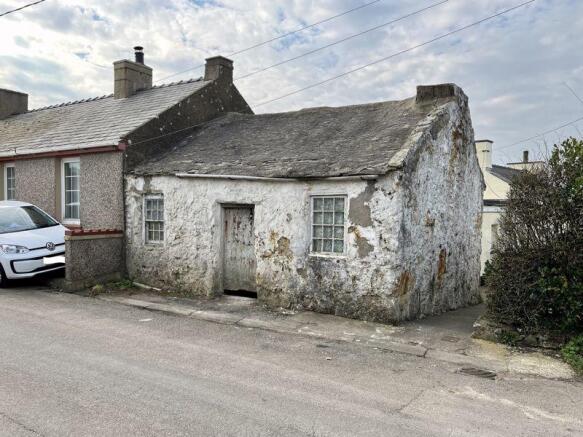 BUILDING (FORMER COTTAGE)