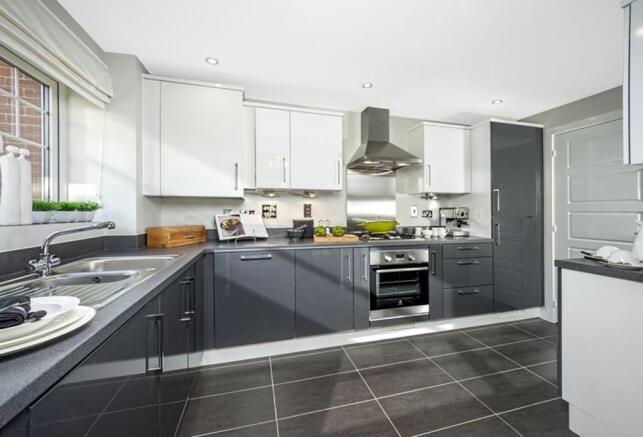 Open plan kitche/dining room with french doors to the rear garden 