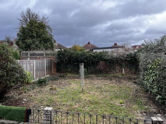 Private rear garden with established hedging an...