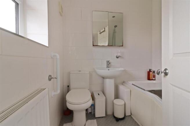 Fully Tiled Cloakroom