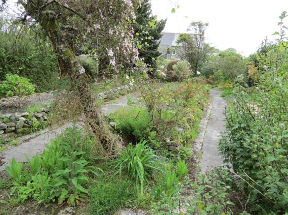 Side & Rear Garden: