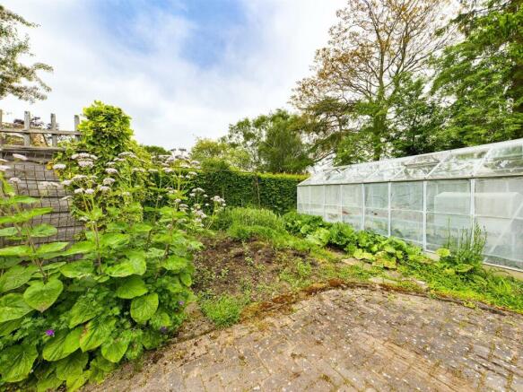 Greenhouse and Front Vegetable Plot