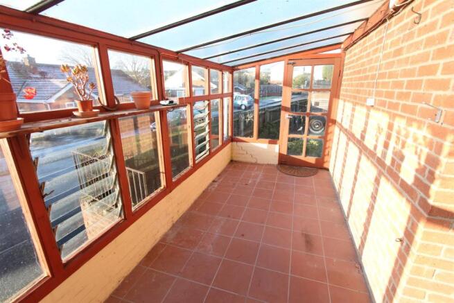 Single glazed conservatory/utility area to side