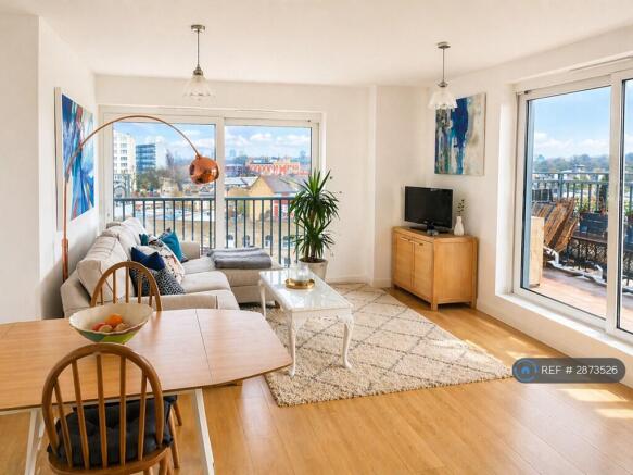 Light Airy Living Room Two Sets Of Sliding Doors