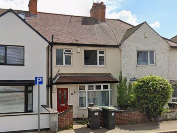 Charming terraced house with classic bay window...