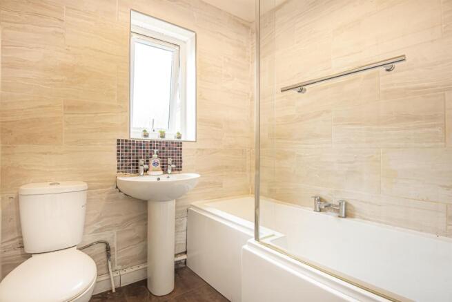 Bathroom with shower over