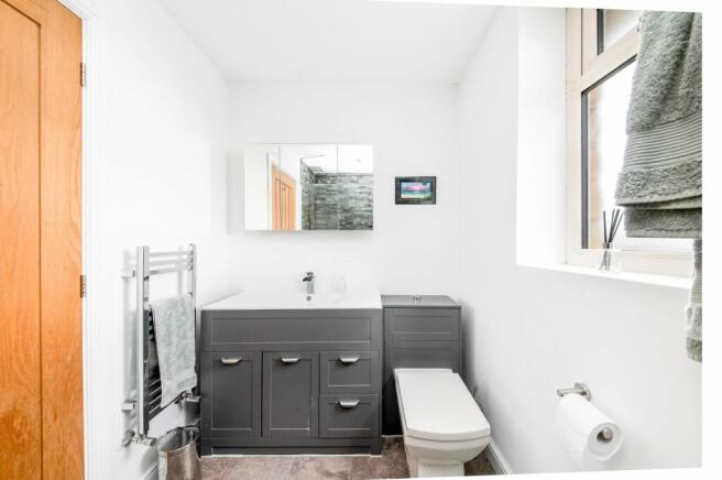 BEDROOM ONE EN-SUITE SHOWER ROOM