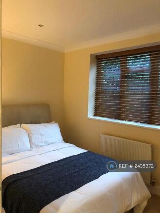 Second Bedroom With Full Length Window And View