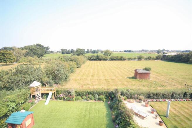 VIEW TO THE REAR OVER COUNTRYSIDE
