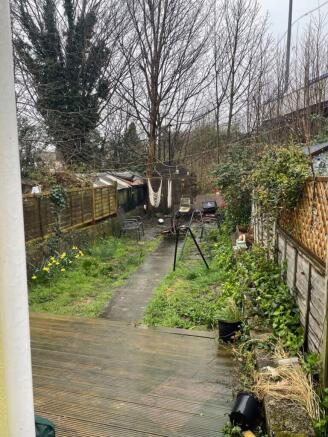 A spacious garden with potential for relaxation...